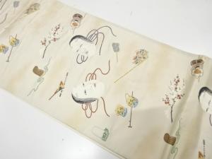 能面に小道具模様織り出し 袋帯